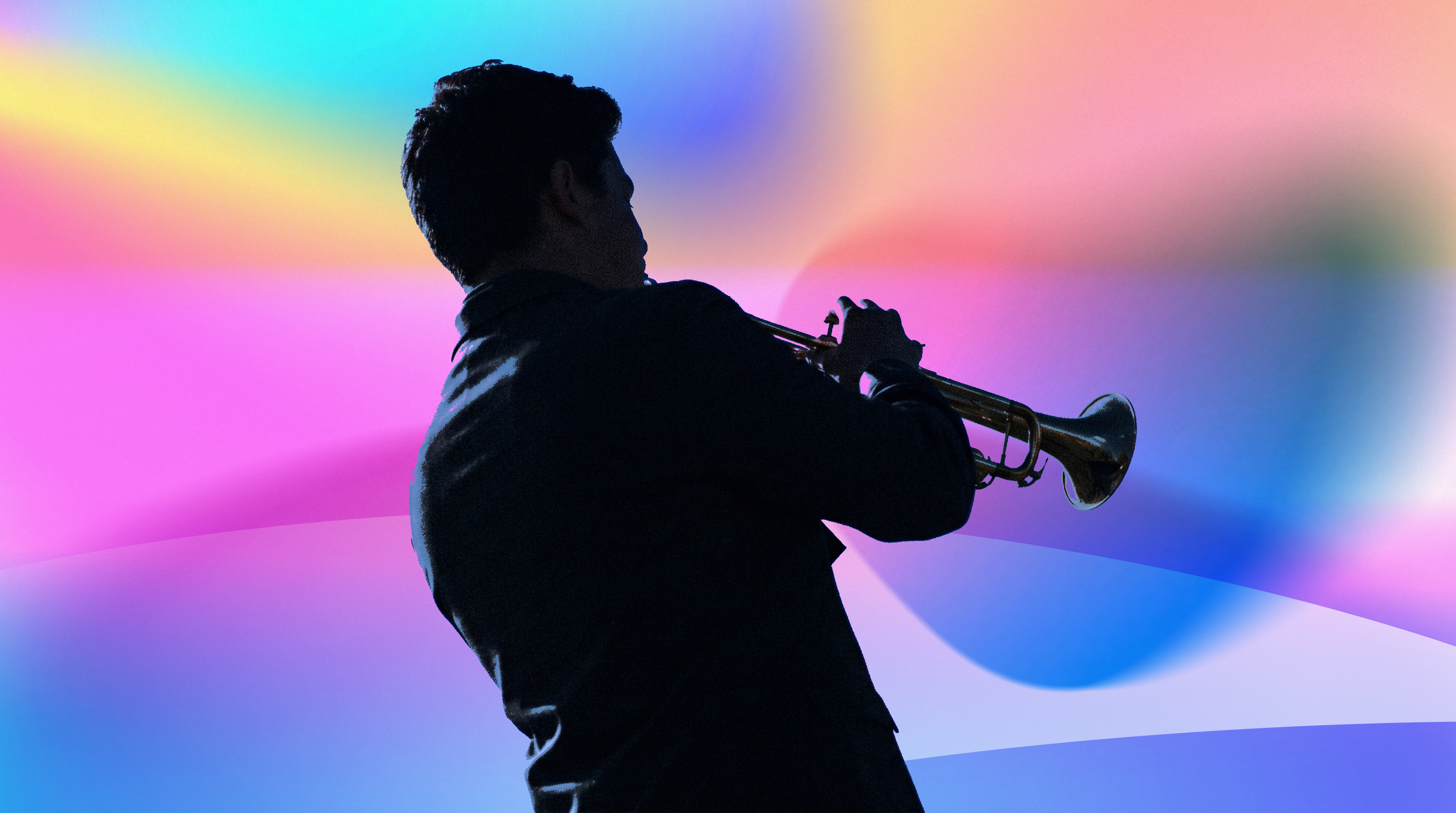 Silhouetted trumpeter against a vibrant color-gradient backdrop